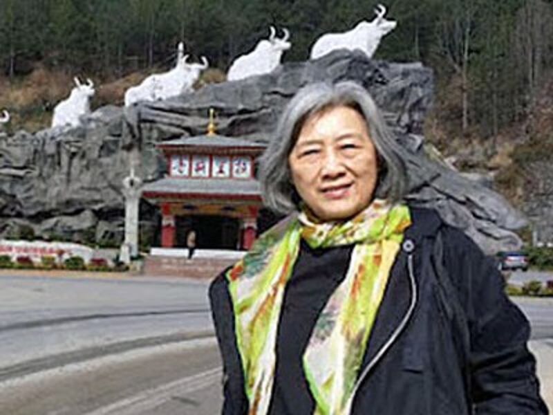 Gao Yu visits a tourist site during her forced 'vacation' in southwestern China's Yunnan province, March 2016.