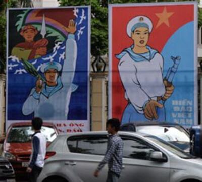 Các pano tuyên truyền trên đường phố Hà Nội. AFP photo