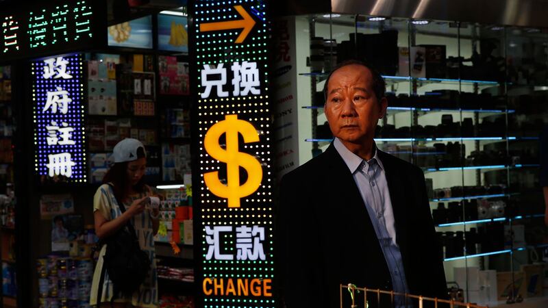 中国为保市场信心尽力维持3万亿外汇储备(资料图/AP)