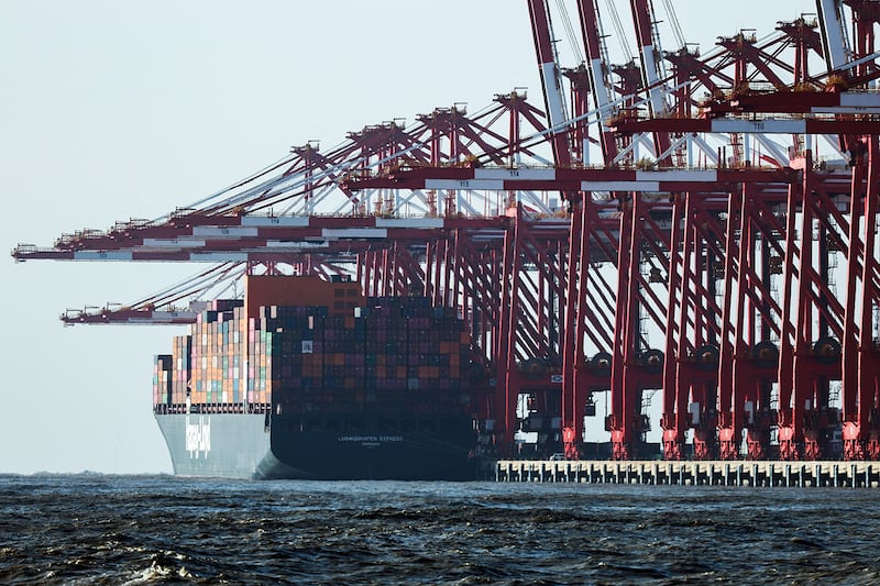 Gantry cranes stand near a cargo ship at Yangshan Port outside of Shanghai, China, Feb. 7, 2025.