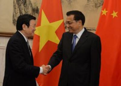 Chủ tịch Việt Nam Trương Tấn Sang (T) và Thủ tướng Trung Quốc Lý Khắc Cường tại Bắc Kinh ngày 20 Tháng 6 năm 2013. AFP photo