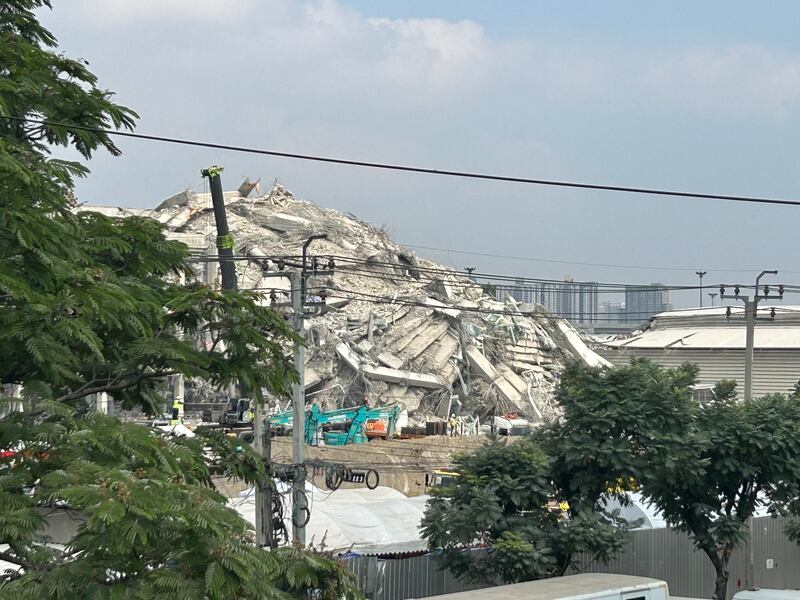 Rescuers search for victims of a high-rise collapse in Bangkok following Friday's powerful earthquake 1,000 kilometers away in Mandalay, Myanmar.