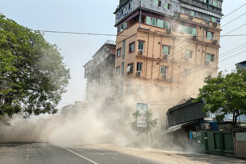 A building collapses in Mandalay, Myanmar, on March 28, 2025, during an earthquake.
