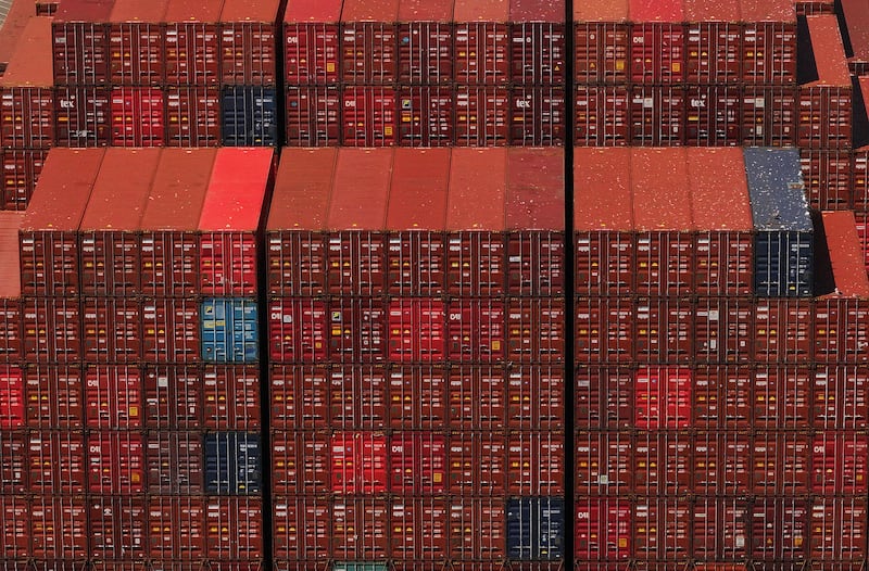 Shipping containers are stacked at the Port of Oakland on April 28, 2025 in Oakland, California.