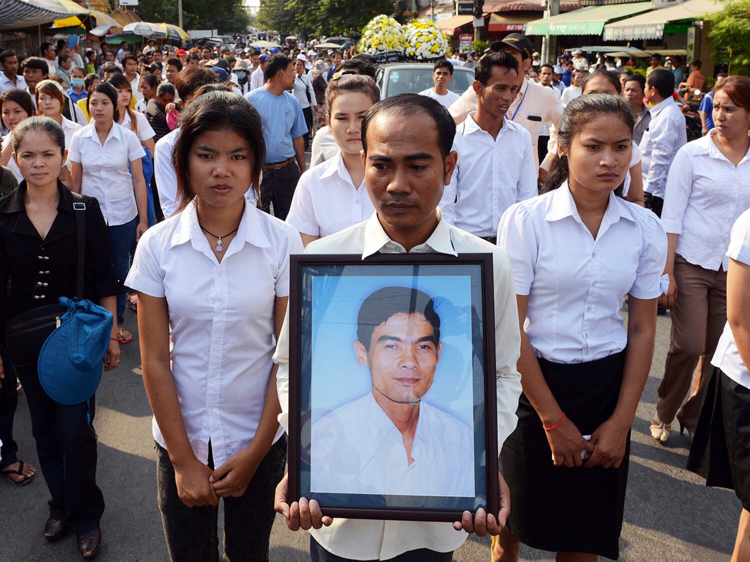 Anniversary of Cambodian labor leader’s killing marked by union members, activists