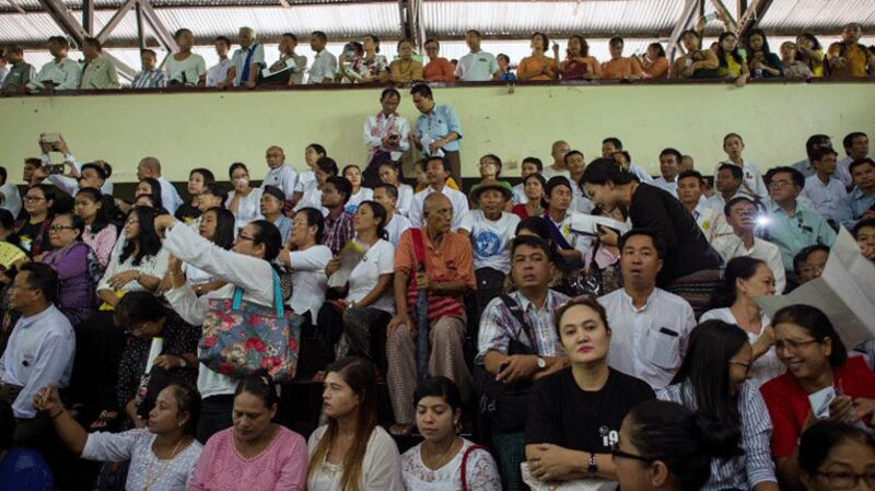 Attendees listen to speeches at a ceremony commemorating the 30th anniversary of Myanmar's Aug. 8, 1988, uprising, at the University of Yangon in Yangon, Aug. 8, 2018.