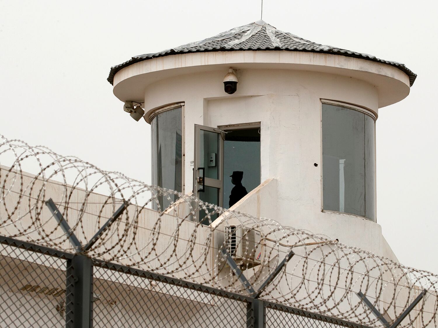 A guard stands in a watchtower at Kashgar Prison in Kashgar, a city in northwestern China's Xinjiang, Uyghur Autonomous Region, China, May 3, 2021.