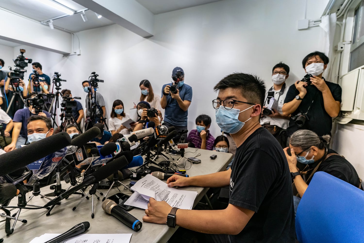 Pro-democracy activist Joshua Wong speaks during a press conference after being disqualified for his Legislative Council nominations on July 31, 2020 in Hong Kong. (Anthony Kwan/Getty Images)