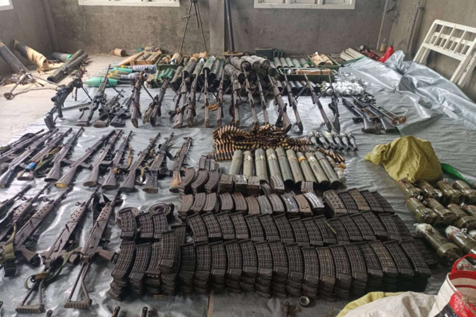 Indaw People’s Defense Force seizes junta weapons after capturing Indaw town in Sagaing region on April 7, 2025.