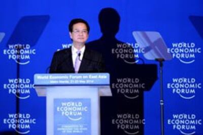 Thủ tướng Việt Nam Nguyễn Tấn Dũng tại Diễn đàn Kinh tế Thế giới về Đông Á ở Manila vào ngày 22 tháng 5 năm 2014. AFP PHOTO / NOEL Celis.