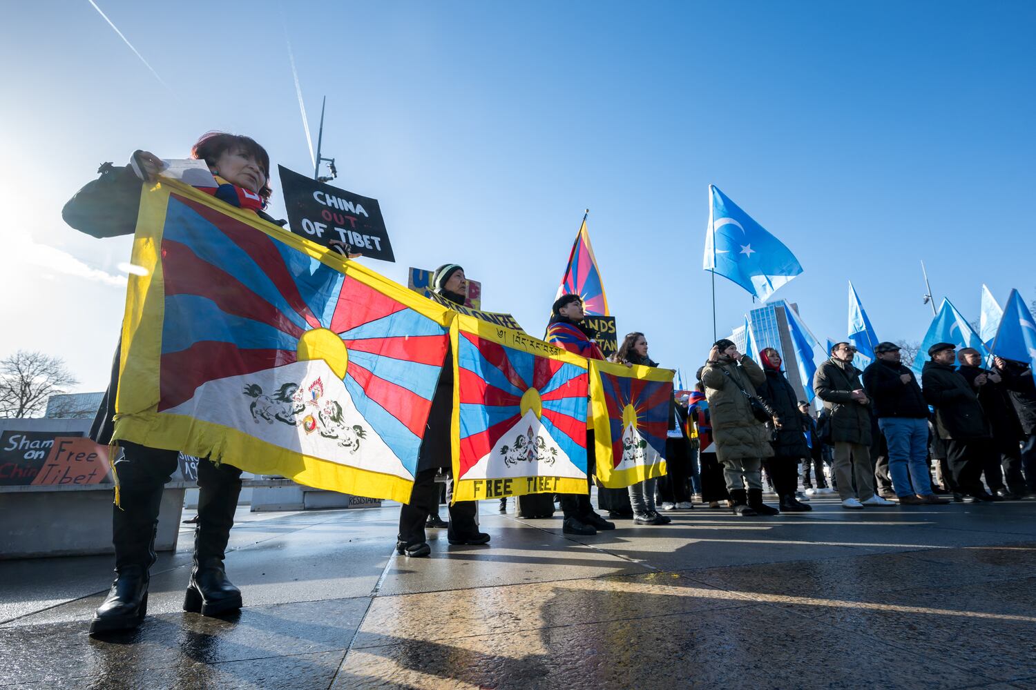 Tibetan and Uyghur activists protest outside of the UN offices in Geneva during the review of China's rights record by the United Nations Human Rights Council, Jan. 23, 2024.