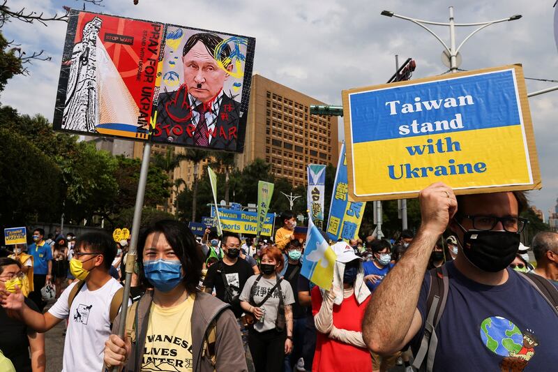 People attend a rally against Russia's invasion of Ukraine in Taipei, Taiwan, March 13, 2022. Credit: Reuters