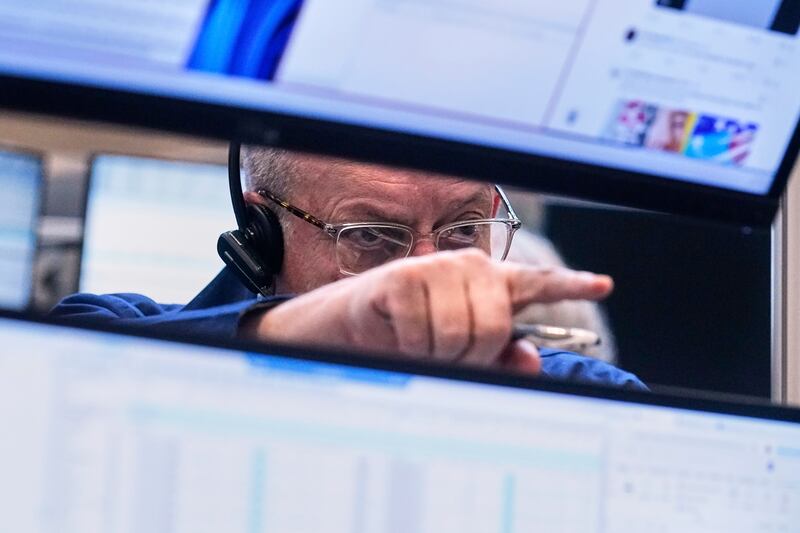 Trader Phil Fralassini works on the options floor of the New York Stock Exchange, April 10, 2025.
