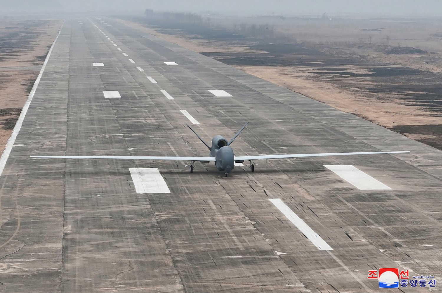A suicide drone equipped with artificial intelligence technology is pictured on a runway, on the day North Korean leader Kim Jong Un guides defense science research projects, according to local media, at an unknown location, in this photo released by North Korea’s official Korean Central News Agency on March 27, 2025.