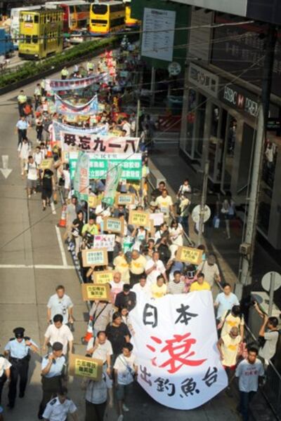 图片:星期六,香港市民游行到日本驻港总领事馆抗议。(记者乔龙摄影)
