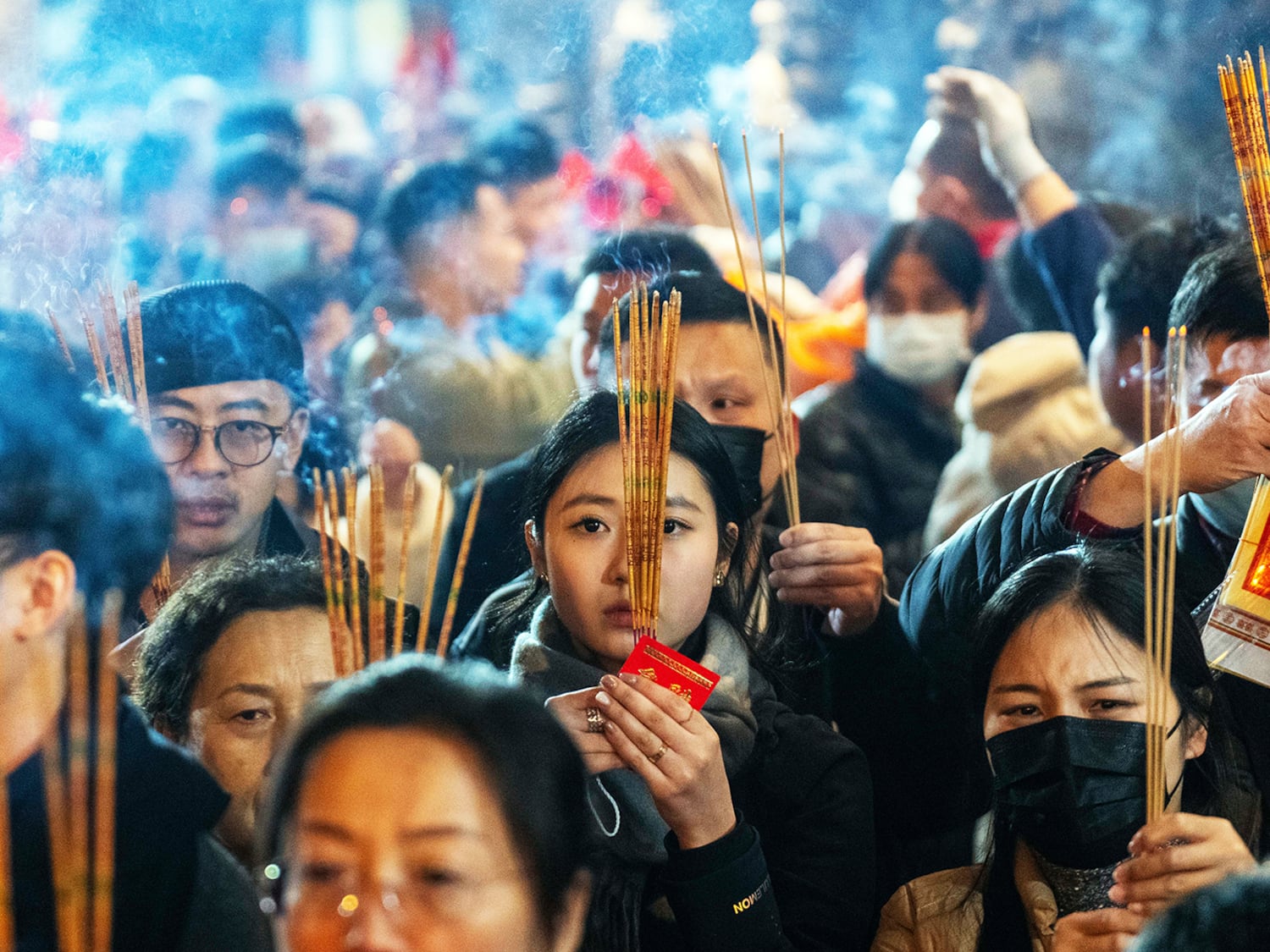 Worshipers burn incense at Wong Tai Sin Temple to welcome the Lunar New Year of the Snake in Hong Kong, Jan. 29, 2025.