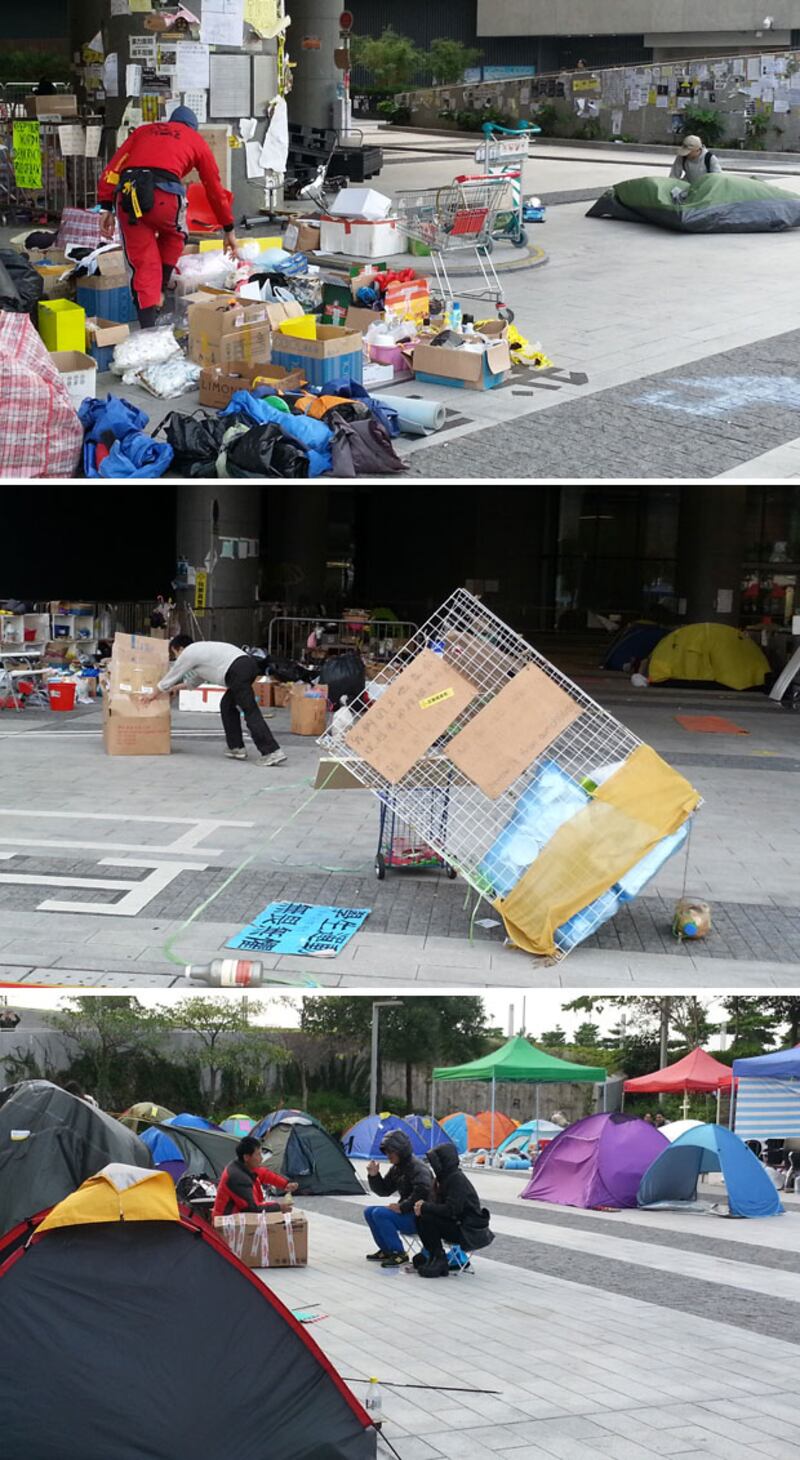 2014年12月12日，立法會外的示威區，仍有少部份佔領人士紮營，消息指最快下周一清場，有人已經在收拾物資。帶不走的物資唯有棄掉。有立法會示威區內的佔領人士表示，會留守至清場一刻。（粵語部林靜攝） 