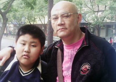 图片:父子俩(志愿者提供)