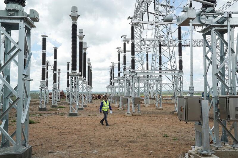 A worker patrols the construction site of the Konza transformer substation in Machakos County, Kenya, May 5, 2023. The substation, located about 70 km (43 miles) southeast of the Kenyan capital Nairobi, is part of the Kenya Power Transmission Expansion Project, a project under China's Belt and Road Initiative. Credit: Han Xu/Xinhua via Getty Images