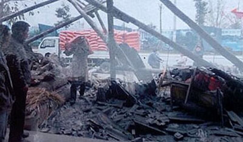 Sch_demolition_Zhang_brother350.jpg