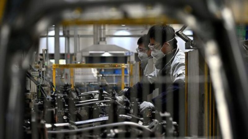 一家遭受疫情影响的中国企业(法新社)