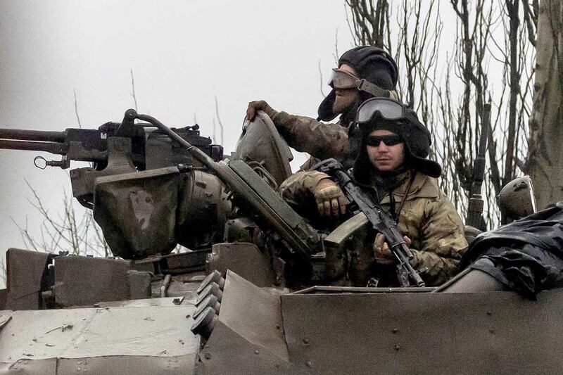 Ukrainian tanks move into Mariupol, Ukraine, on Feb. 24, 2022. (Reuters)