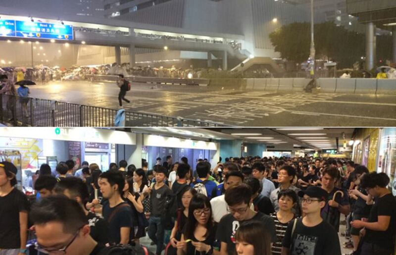 2014年9月30日，位於金鐘的佔中集會地點，入夜後曾下過一場雨，但前來的市民相反起來越多，擠滿了港鐵站。(現場人士提供)