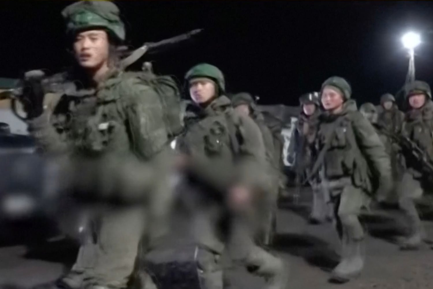 Images made from video released by Russian state media on April 28, 2025, show North Korean troops training in Russia at an undisclosed location.