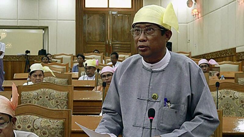 Kyaw Aye Thein, Rakhine state's minister of finance, revenue, planning, and economy, speaks during a session of the Rakhine state parliament in Sittwe, western MYanmar's Rakhine state, Sept. 25, 2018.