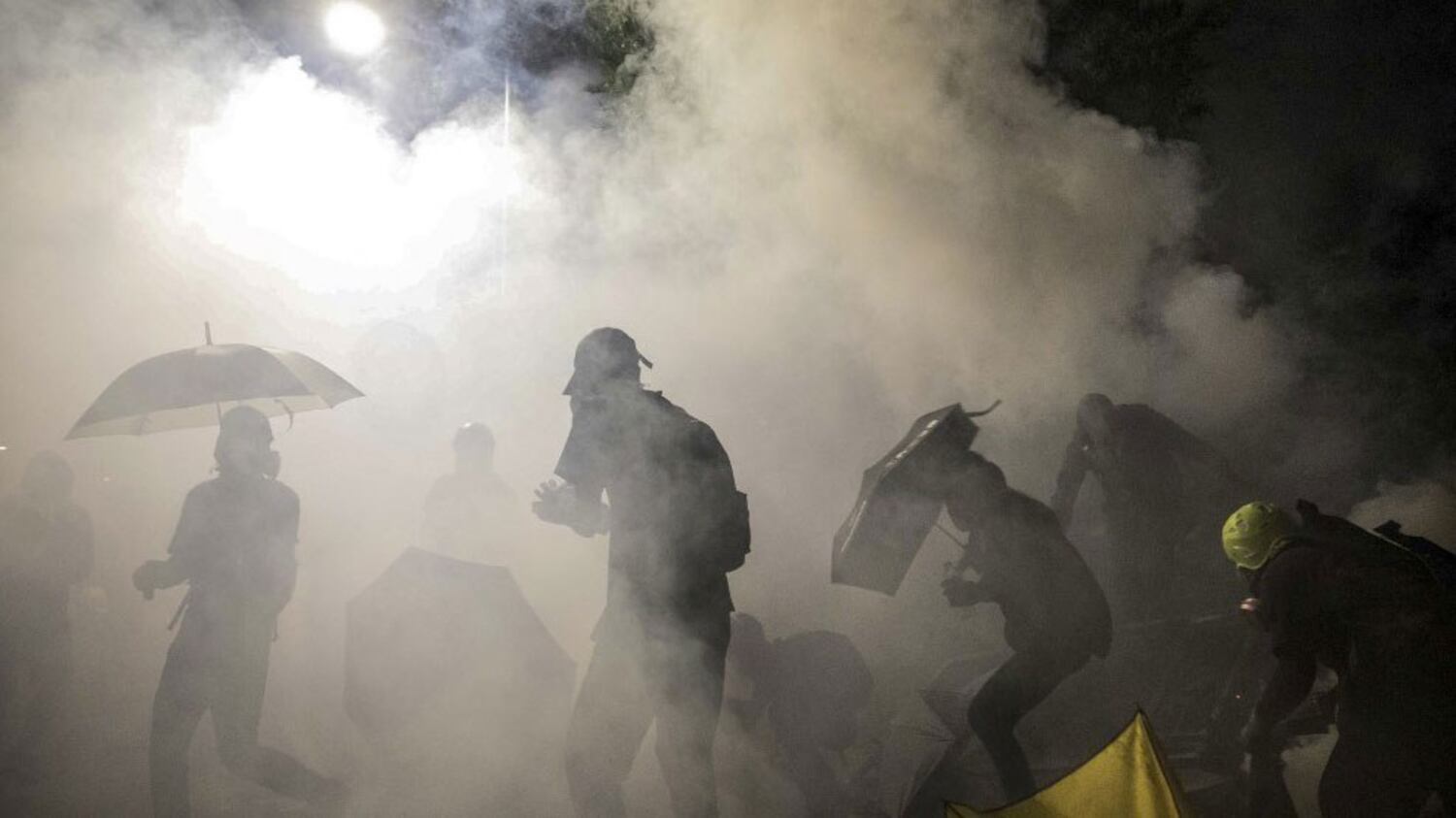Hong Kong Police Tear Gas University Chief in Campus Siege