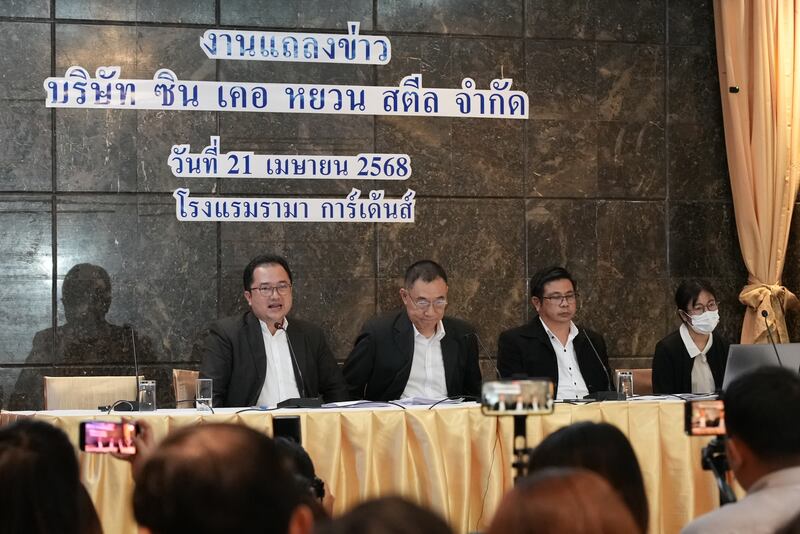Xin Ke Yuan’s lawyer Piyapong Kongmaruan, left, and his associate lawyer speak to the media at a Bangkok hotel on April 21, 2025