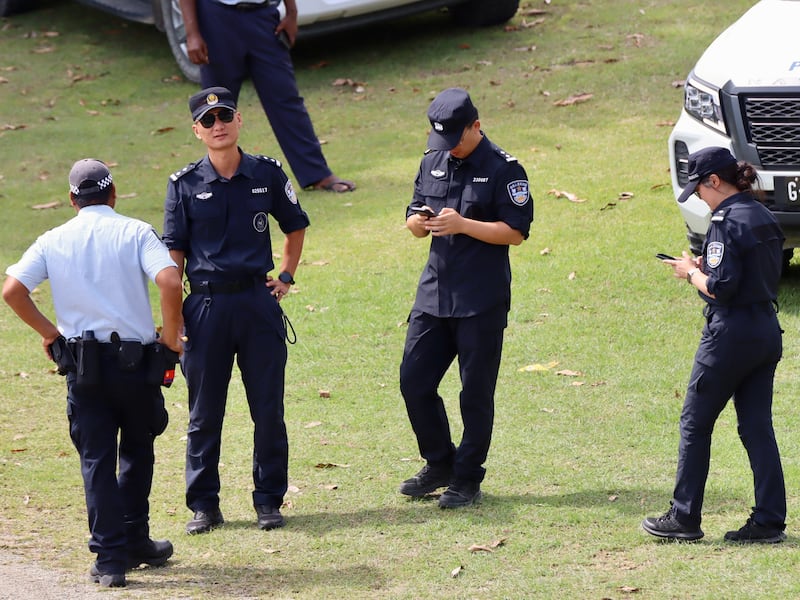 Chinese police personnel on the grounds of the parliament building during the prime ministerial election in Honiara, Solomon Islands, May 15, 2026.