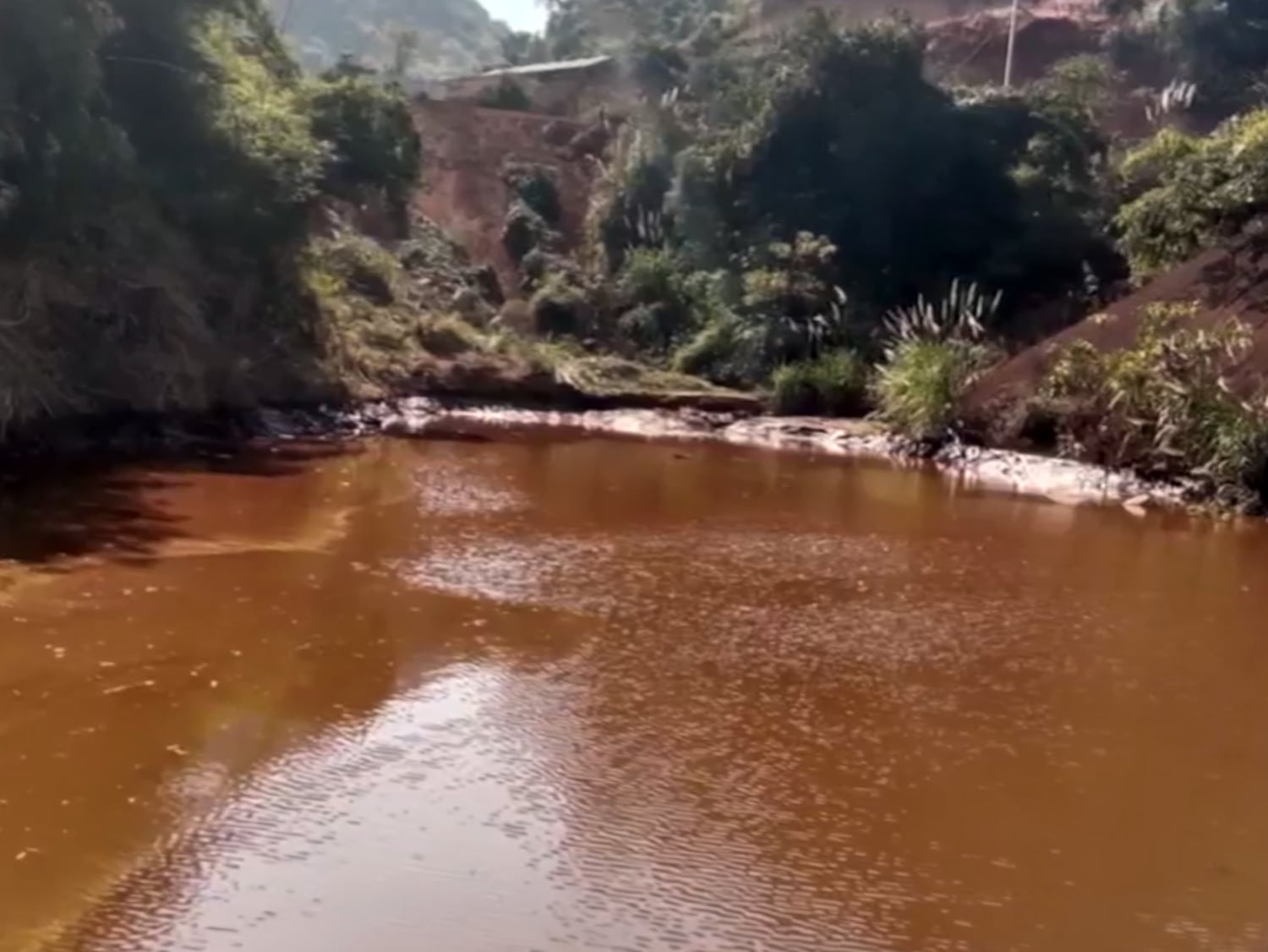 Lao authorities temporarily close iron ore mine after spillage pollutes rivers