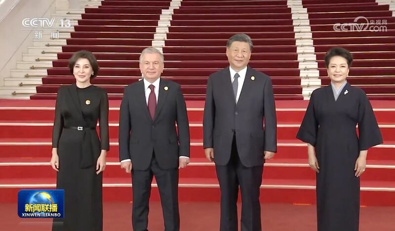 去年（2023年）俄羅斯總統普京出席「一帶一路」高峰論壇， 彭麗媛陪伴在習近平身邊。（央視截圖）