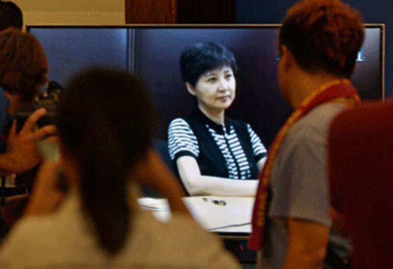 Bo Xilai's wife Gu Kailai, convicted last year of murdering British businessman Neil Heywood, gives a recorded testimony during Bo's trial, Aug. 23, 2013. AFP