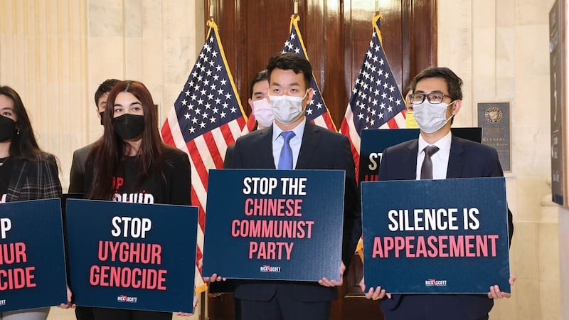 HKDC執行總監梁繼平(中)則向本台透露,美國國會上下對北京冬奧普遍反感。(胡凱文 攝)