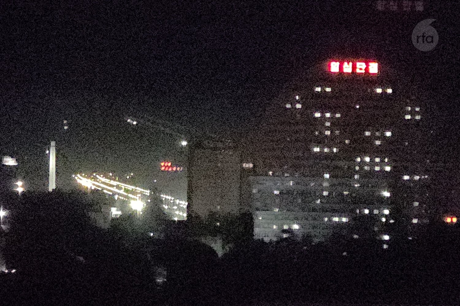 Route 1, the main highway linking Sinuiju to Pyongyang, as viewed from Dandong, China. Courtesy of Professor Park Jongchol.