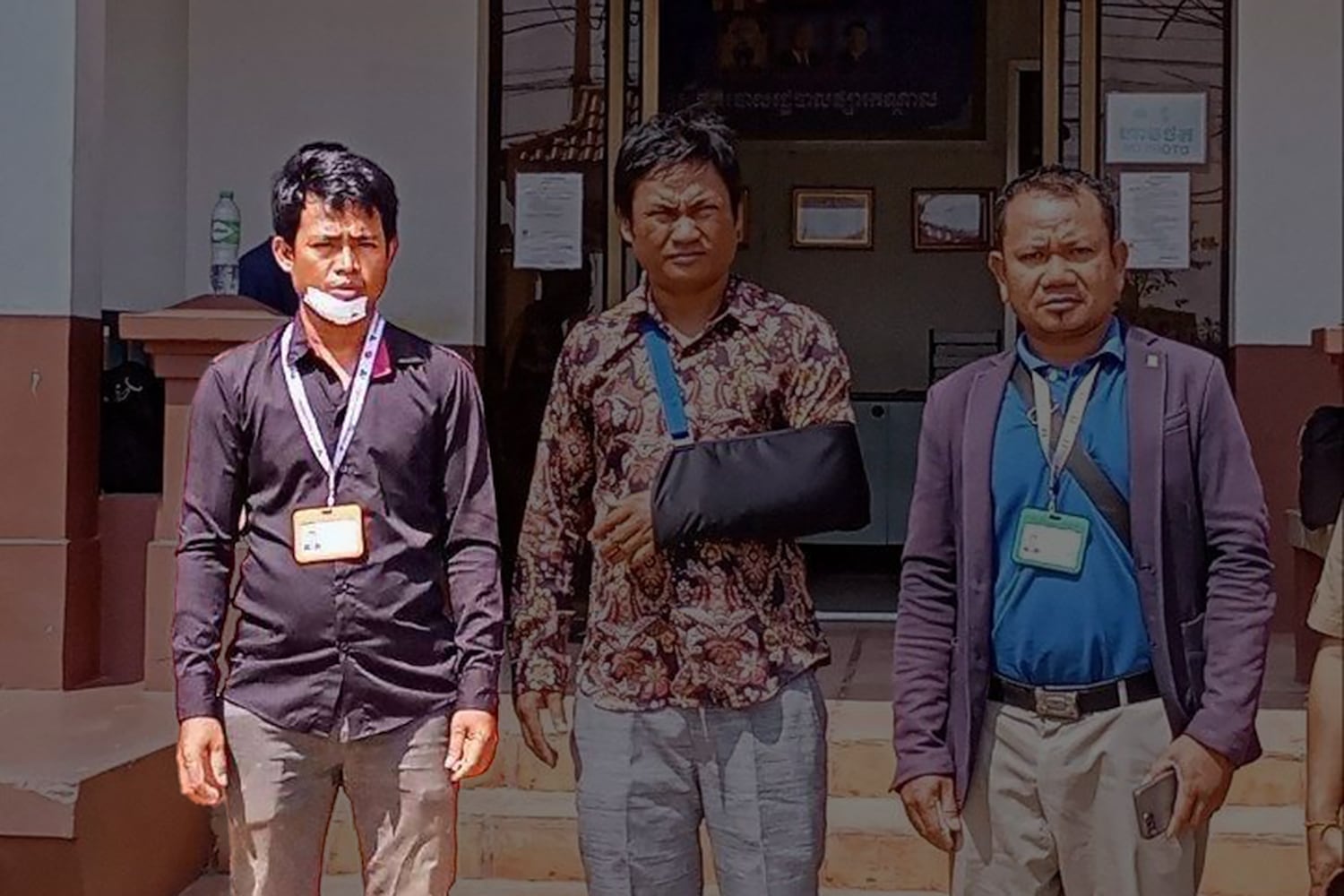 Loun Phearin, left, and other victims file a complaint following the attack on March 2.