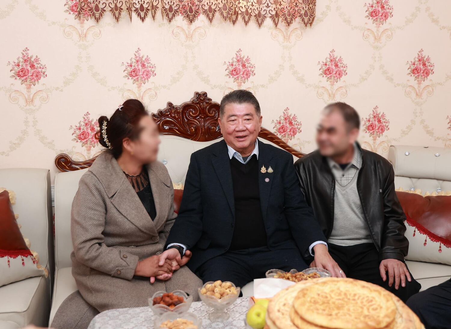 Thailand's Deputy Prime Minister Phumtham Wechayachai visits one of the 40 Uyghurs at the Uyghur's home in Kashgar, Xinjiang Autonomous Region, March 19, 2025.
