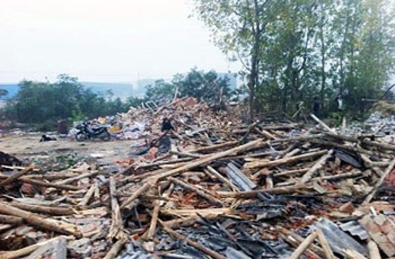 凡桂岑丈夫開設的豬場被政府強拆,當時她與丈夫被軟禁在別處。(照片由拆遷戶提供)