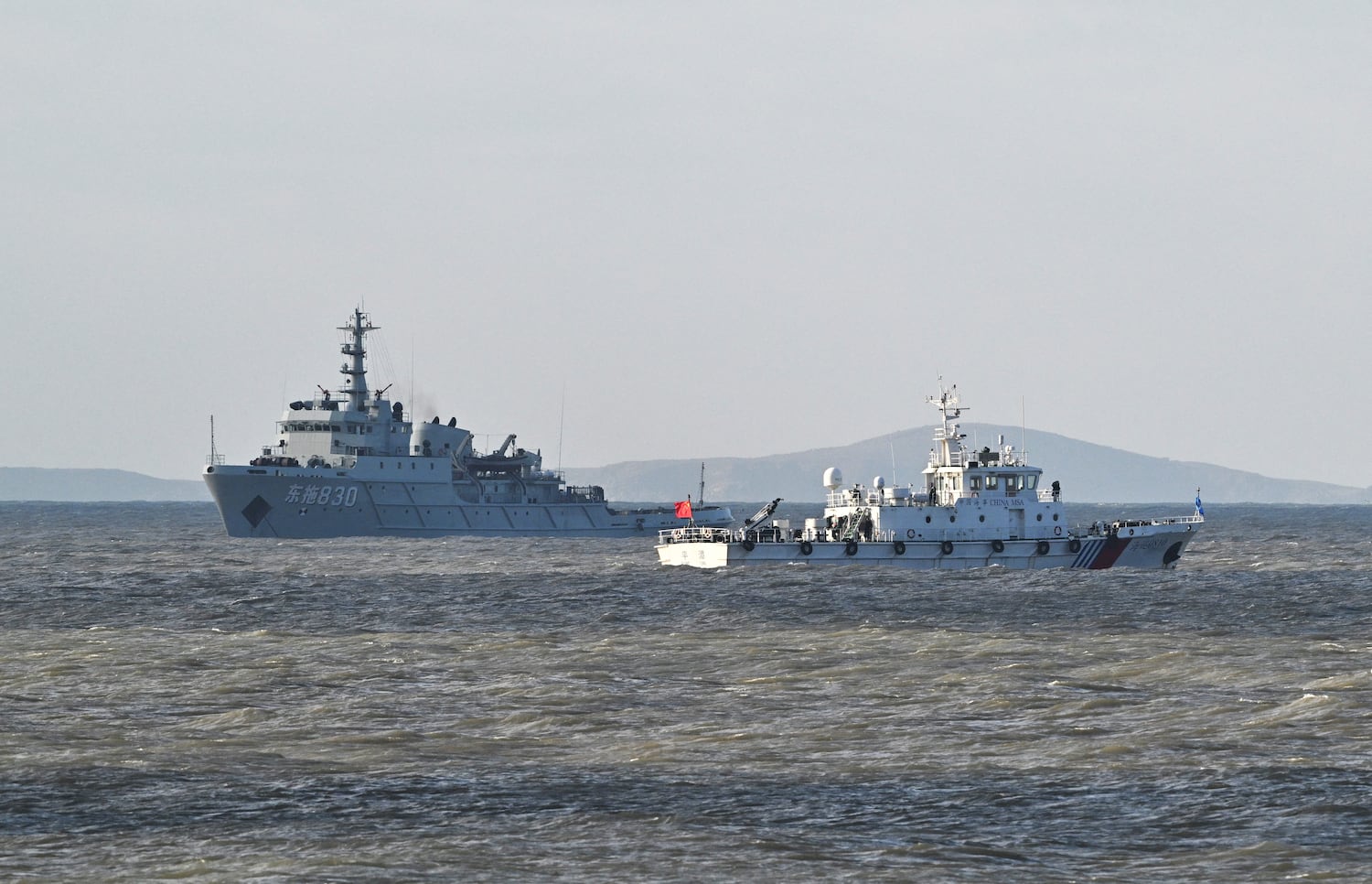 Chinese ships patrol during military drills on Pingtan island, the closest point to Taiwan, on Dec. 30, 2025.
