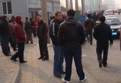 图片:有访民的地方就有警车,图为国务院信访办附近。(志愿者提供)