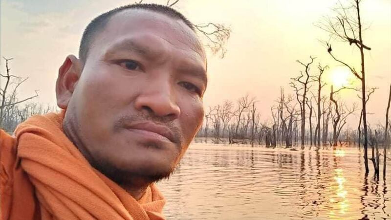 Monk protect forest at Odor Meanchey.jpg