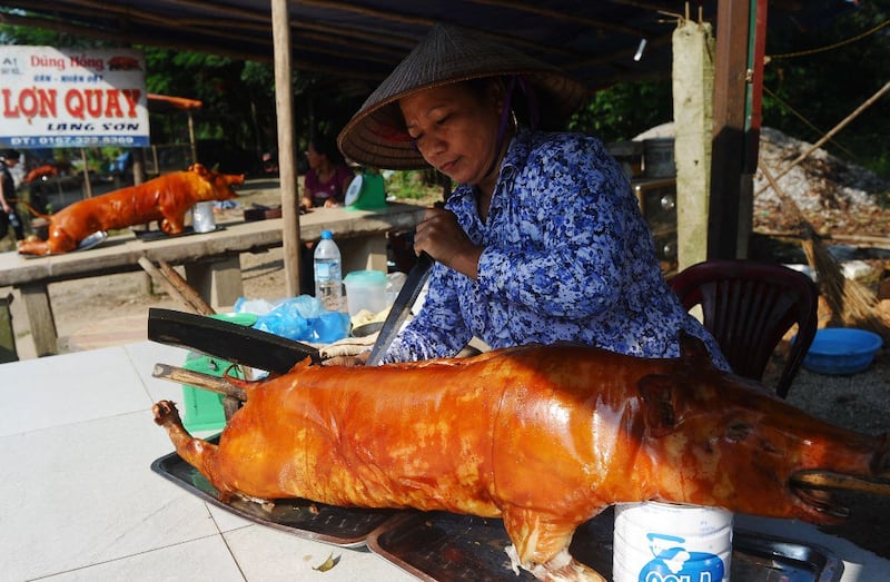 Ảnh minh họa: Thịt heo quay. AFP