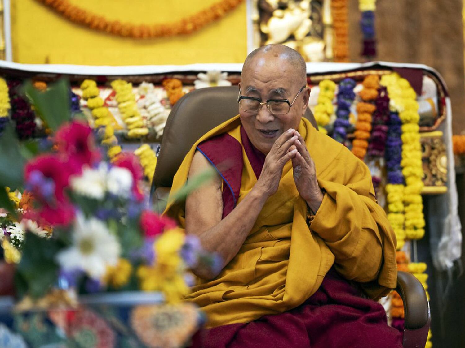 The Dalai Lama waits to speak to the congregation during a welcome ceremony at Tashi Lhunpo Monastery at the Bylakuppe Tibetan Settlement in the Indian state of Karnataka, Jan. 5, 2025.