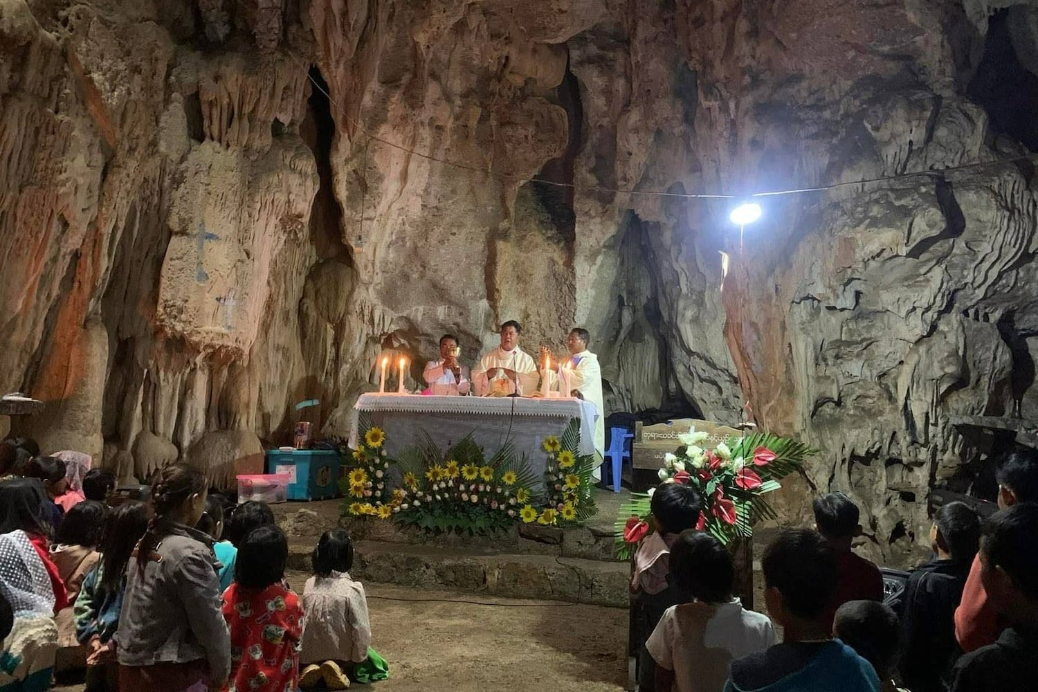 Myanmar Christians, wary of airstrikes, celebrate Christmas in a cave