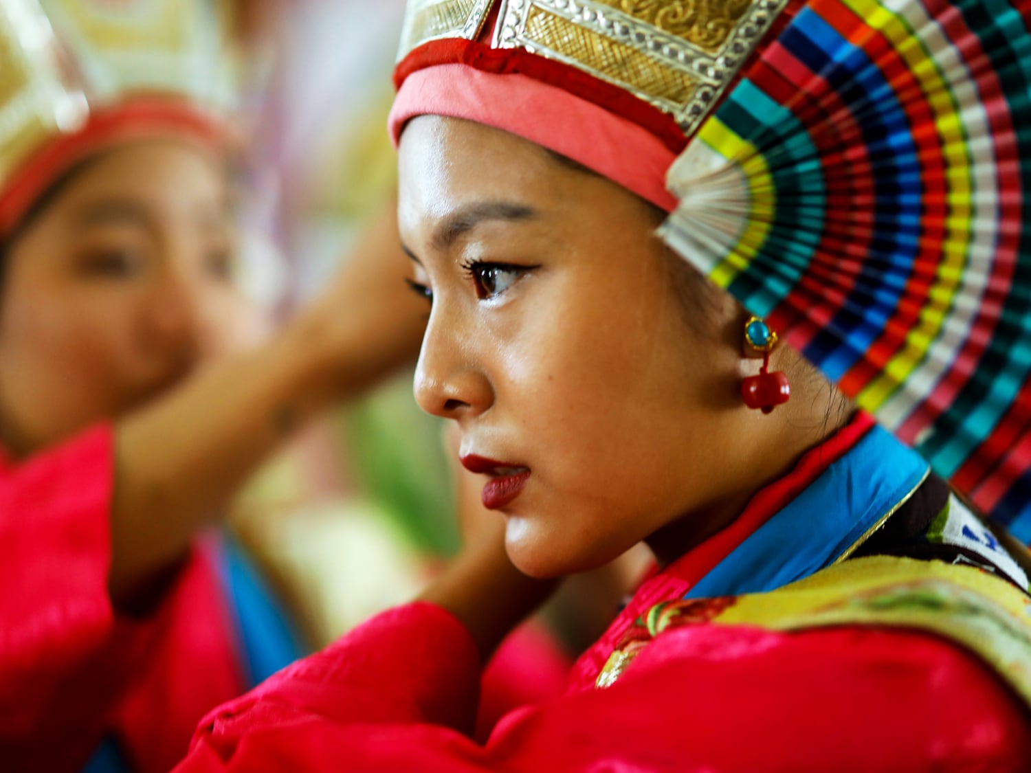 Tibetan women prepare for a ritual dance as they celebrate the Losar, or Tibetan New Year in Kathmandu, Nepal, Feb. 23, 2023.