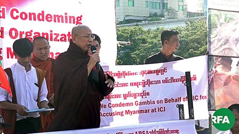 Myanmar former Buddhist abbot Parmaukkha speaks to nationalist activists during a protest against the Organization of Islamic States and a lawsuit against Myanmar at the International Court of Justice, in Yangon, Nov. 25, 2019.