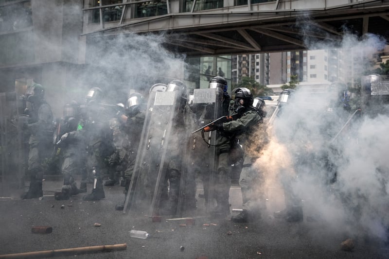 Police fire tear gas at protesters during clashes after an anti-government rally in Tsuen Wan district on August 25, 2019 in Hong Kong.