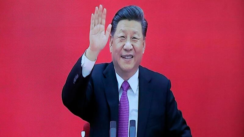 2019年12月2日，中国国家主席习近平出席一项活动时挥手。（资料图片/美联社）